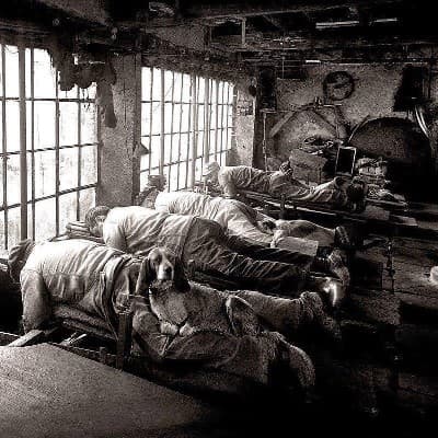 1902 French Knife Grinders: Innovative Work Stance for Back Pain Relief